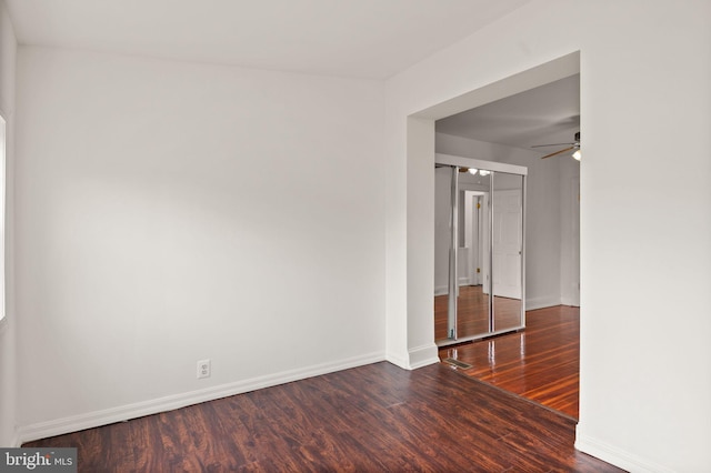 empty room with wood-type flooring and ceiling fan