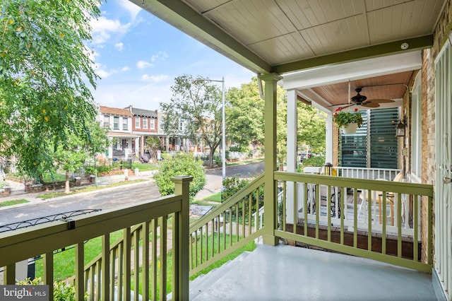 balcony with ceiling fan and covered porch