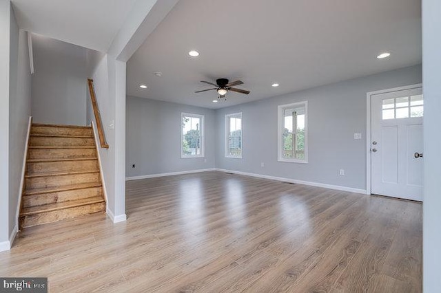 interior space with light hardwood / wood-style flooring and ceiling fan