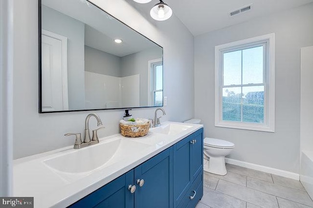 full bathroom with shower with separate bathtub, vanity, tile patterned flooring, and toilet