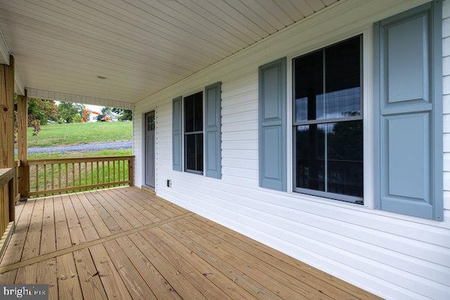 deck with covered porch