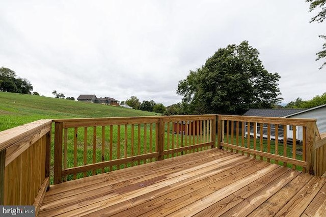 deck featuring a yard