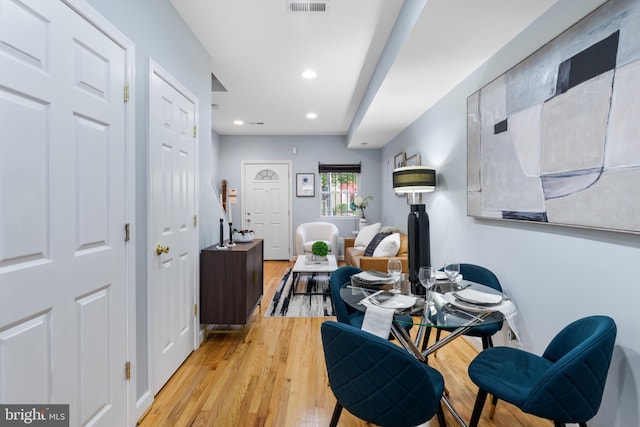 dining area with light wood-type flooring