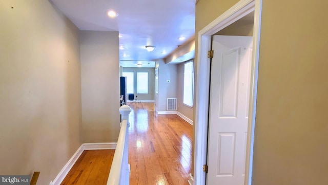 hallway featuring light hardwood / wood-style floors