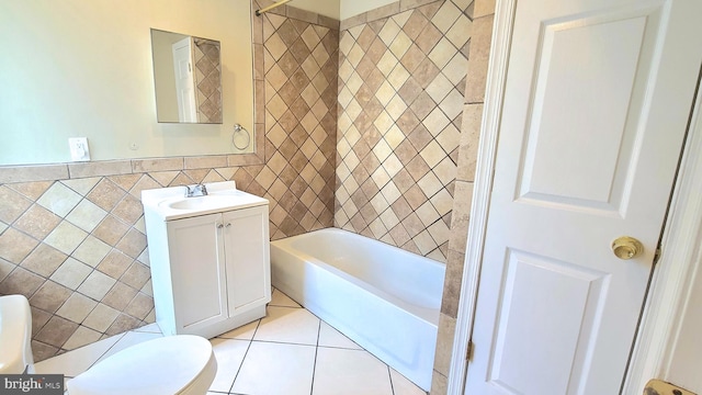 full bathroom with shower / bathtub combination, vanity, tile walls, tile patterned flooring, and toilet