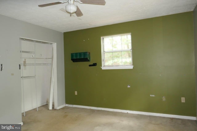 unfurnished bedroom featuring a textured ceiling, light carpet, and ceiling fan