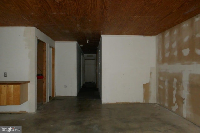 empty room with wood ceiling