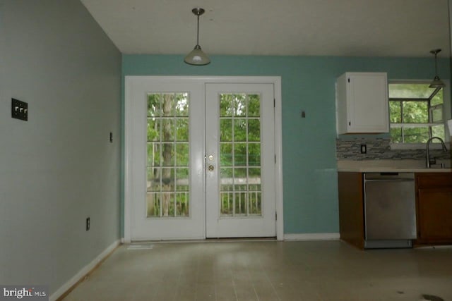 entryway featuring french doors and sink