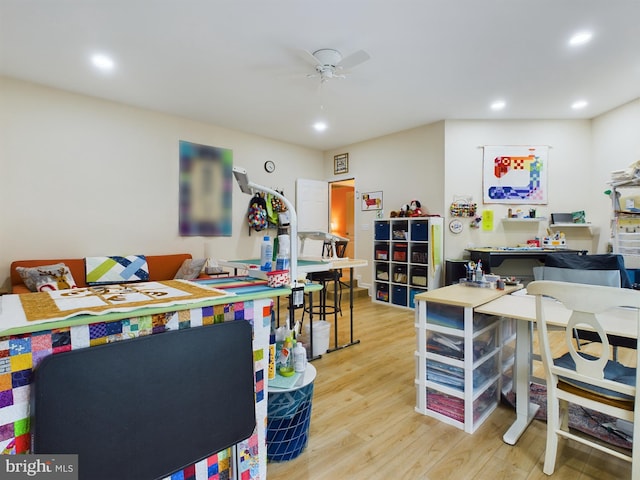 interior space featuring light wood-type flooring and ceiling fan