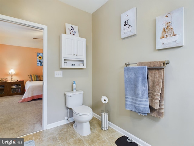 bathroom with tile patterned floors and toilet