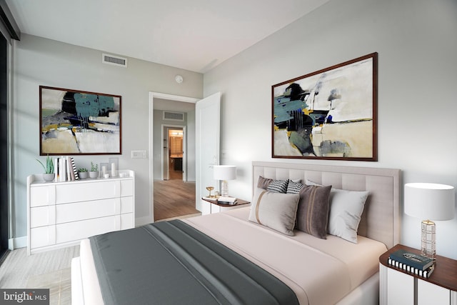 bedroom featuring light wood-type flooring