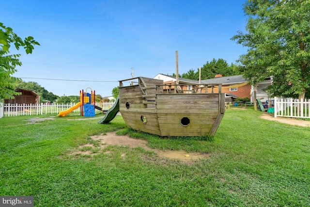 view of yard with a playground