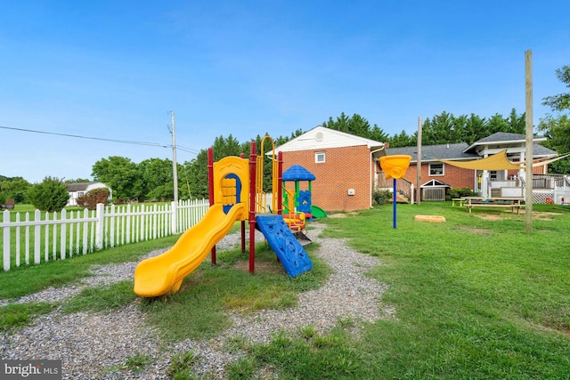 view of jungle gym with a yard