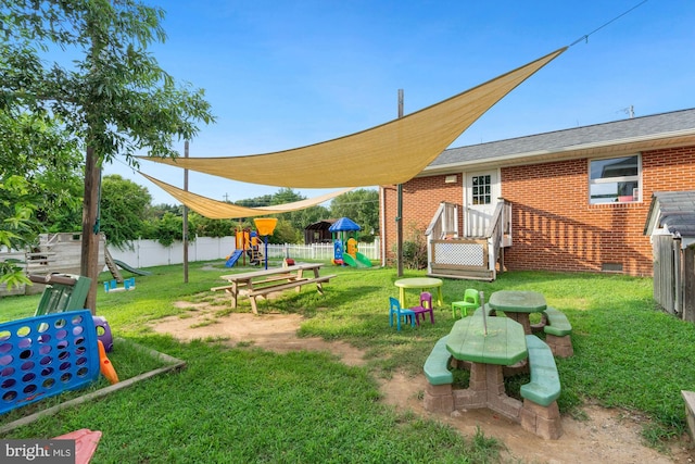 view of yard with a playground