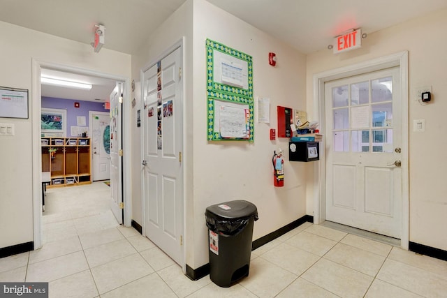 entrance foyer featuring light tile patterned floors