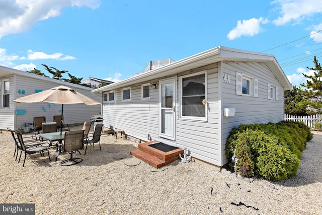 rear view of property with a patio