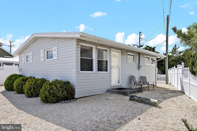 view of front of house with a patio area