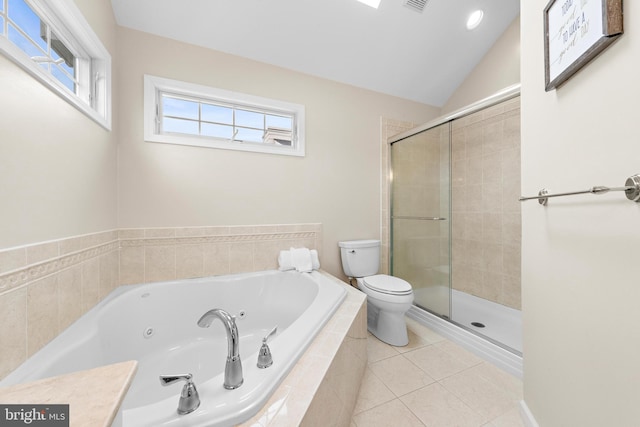 full bathroom featuring independent shower and bath, toilet, and a wealth of natural light