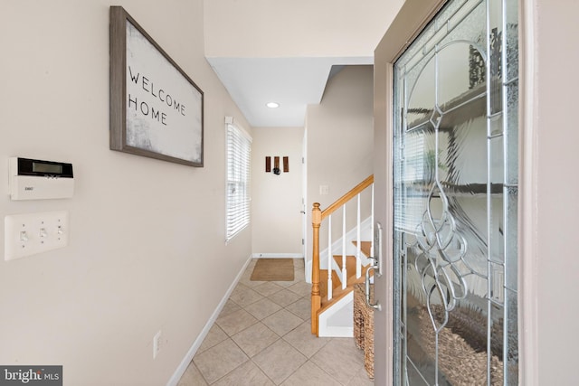 interior space with light tile patterned floors