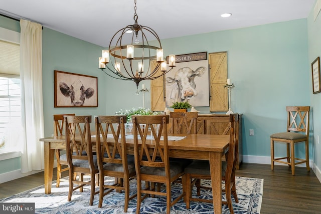 dining area featuring a notable chandelier and dark wood-type flooring