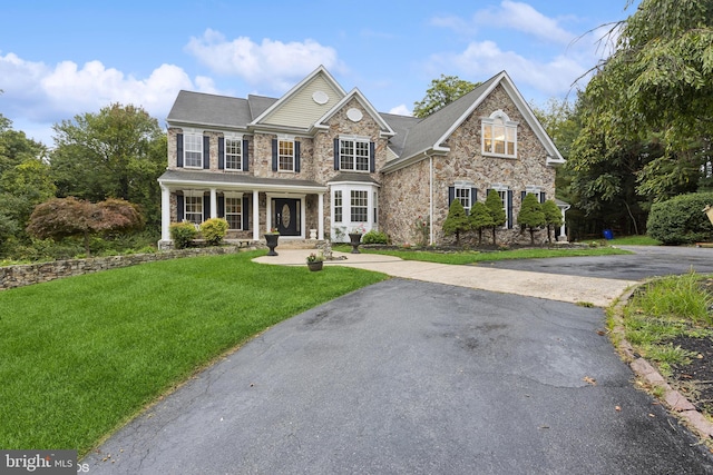 view of front of house with a front yard