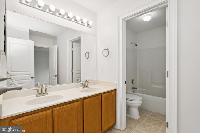 full bathroom featuring bathing tub / shower combination, vanity, toilet, and tile patterned floors