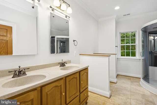 bathroom featuring ornamental molding, tile patterned floors, a shower with door, and vanity