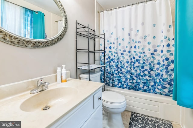 full bathroom with tile patterned floors, vanity, shower / bath combination with curtain, and toilet