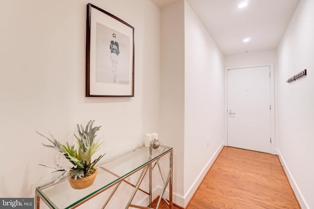 hallway featuring light wood-type flooring