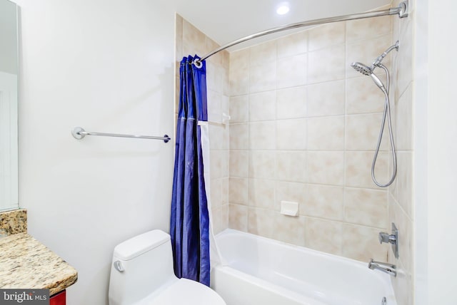 full bathroom featuring toilet, vanity, and shower / bathtub combination with curtain