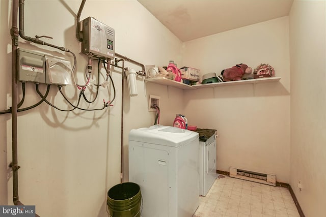 clothes washing area with washer / dryer