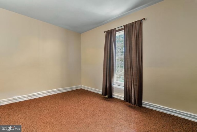 view of carpeted spare room