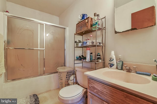 full bathroom featuring bath / shower combo with glass door, vanity, and toilet