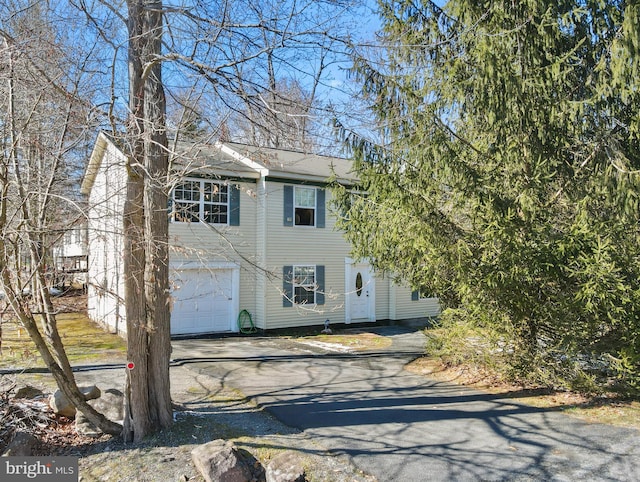 view of front of property featuring a garage