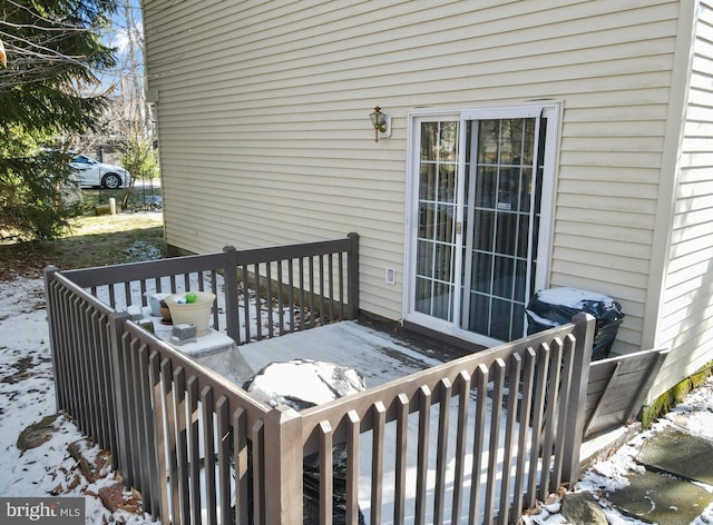 view of snow covered deck