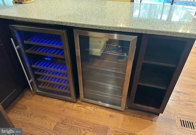 206 Mustang Ct, Gambrills, MD 21054 - details featuring wine cooler, light stone counters, and visible vents