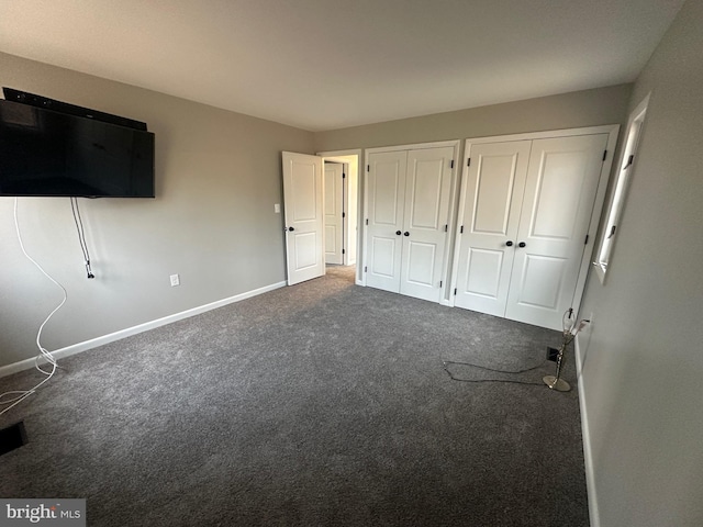 206 Mustang Ct, Gambrills, MD 21054 - unfurnished bedroom featuring baseboards, multiple closets, and carpet floors