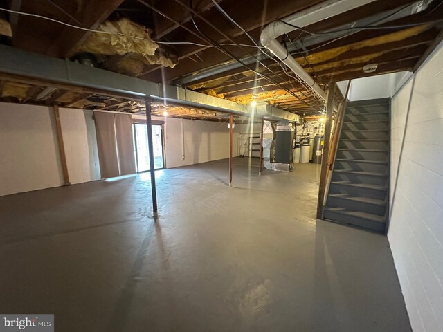 206 Mustang Ct, Gambrills, MD 21054 - below grade area featuring heating unit and stairs