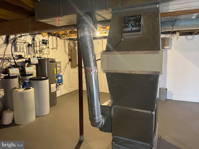 206 Mustang Ct, Gambrills, MD 21054 - unfinished basement with heating unit, water heater, and concrete block wall