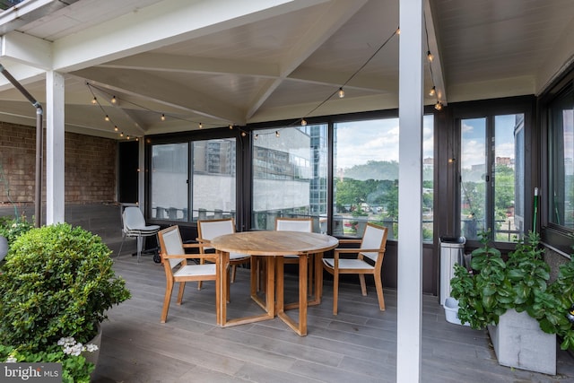 sunroom / solarium with beam ceiling