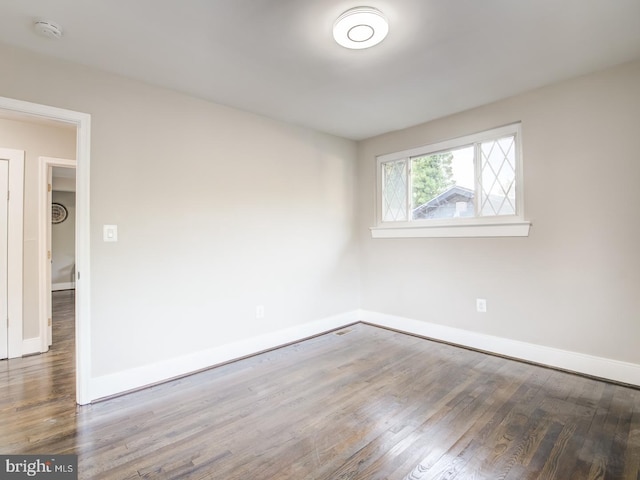 empty room featuring wood-type flooring