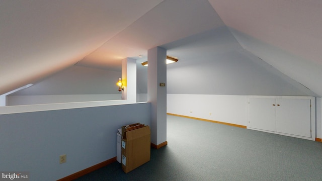 additional living space with lofted ceiling and light colored carpet