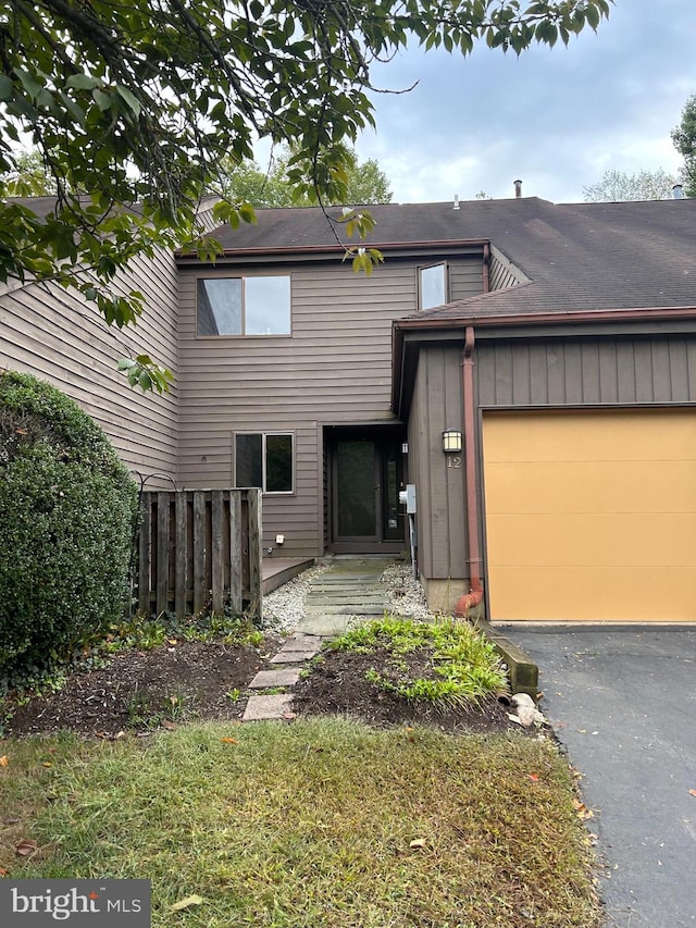 exterior space with a garage