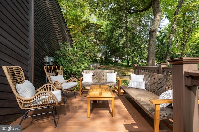 wooden deck with outdoor lounge area