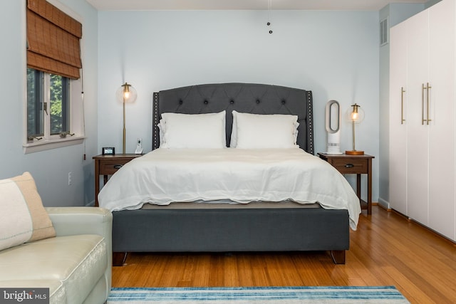 bedroom featuring light hardwood / wood-style floors