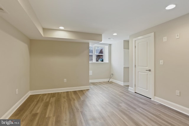 unfurnished room featuring light hardwood / wood-style floors