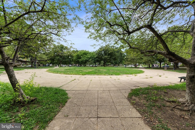 surrounding community featuring a yard