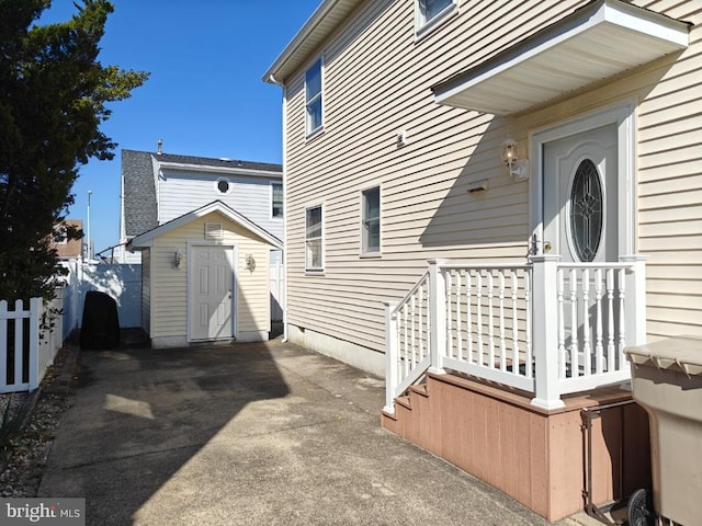 exterior space featuring a shed