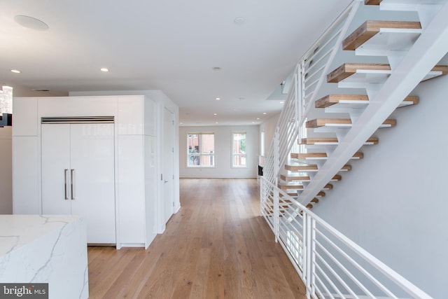 foyer entrance featuring light wood-type flooring