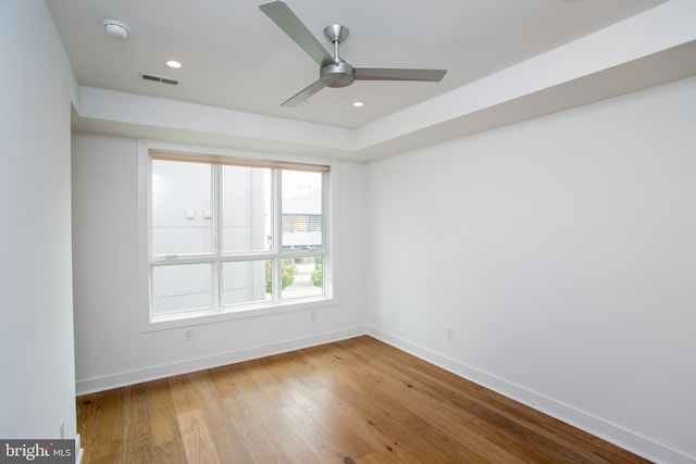 unfurnished room with light hardwood / wood-style floors and ceiling fan